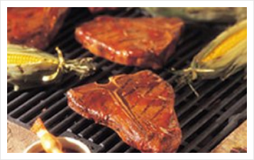 Grilled Steak and Corn Photo